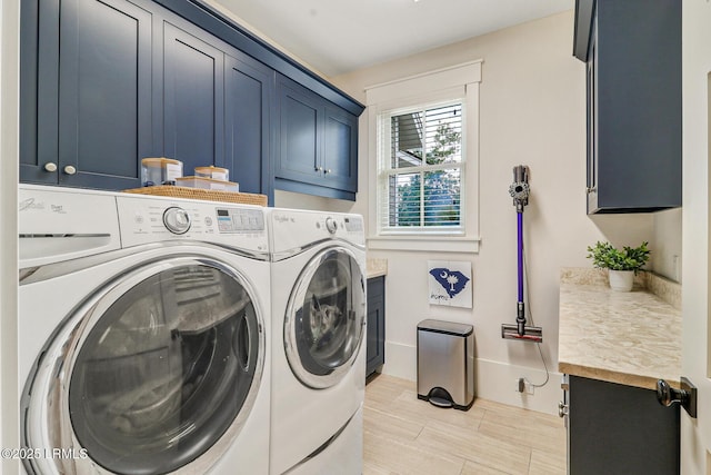 24 Carrier Blf, Bluffton, SC 29909 - laundry area featuring cabinet space, independent washer and dryer, and wood finish floors