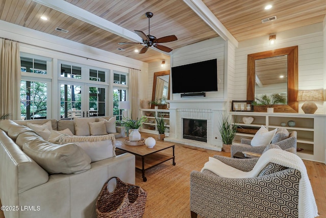 24 Carrier Blf, Bluffton, SC 29909 - living room with wood ceiling, light wood-style floors, a ceiling fan, a fireplace, and recessed lighting