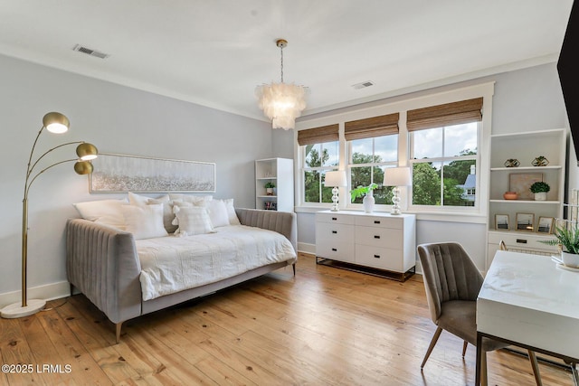 24 Carrier Blf, Bluffton, SC 29909 - bedroom featuring a chandelier and light wood-type flooring