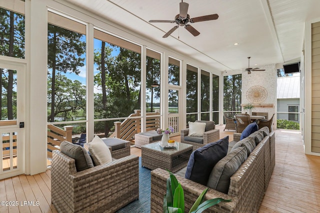 24 Carrier Blf, Bluffton, SC 29909 - sunroom / solarium with ceiling fan and an outdoor hangout area