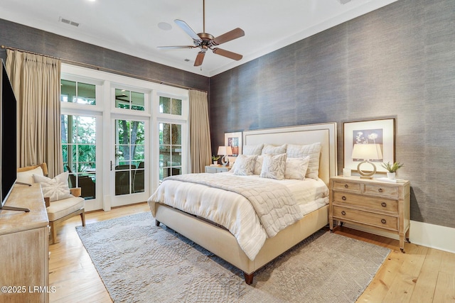 24 Carrier Blf, Bluffton, SC 29909 - bedroom featuring access to outside, wood-type flooring, and ceiling fan