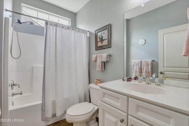 full bathroom with tile patterned floors, toilet, vanity, and shower / bath combination with curtain