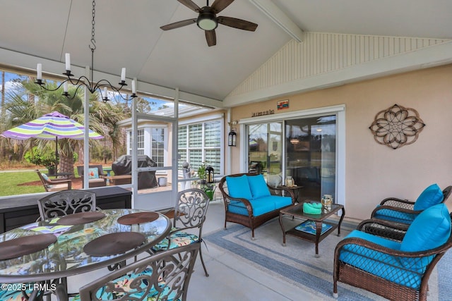 sunroom / solarium featuring vaulted ceiling with beams and a ceiling fan