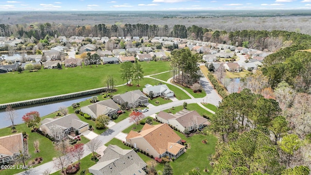 aerial view featuring a residential view and a water view