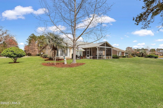 view of yard featuring a sunroom