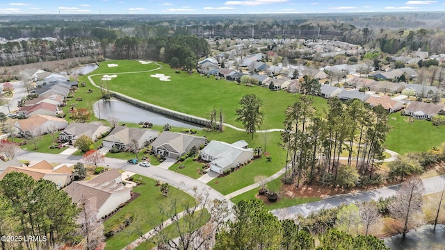 bird's eye view featuring a residential view and a water view