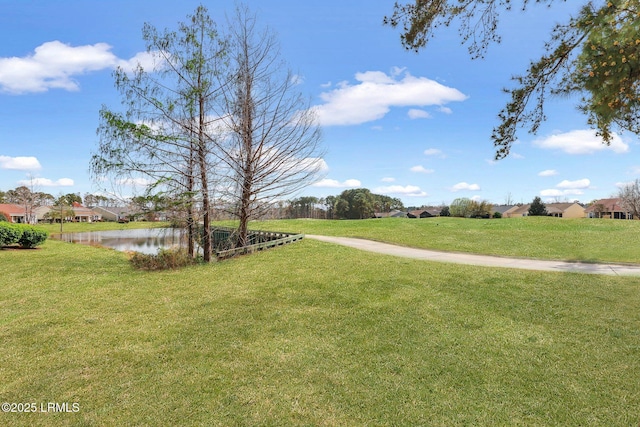 view of yard featuring a water view