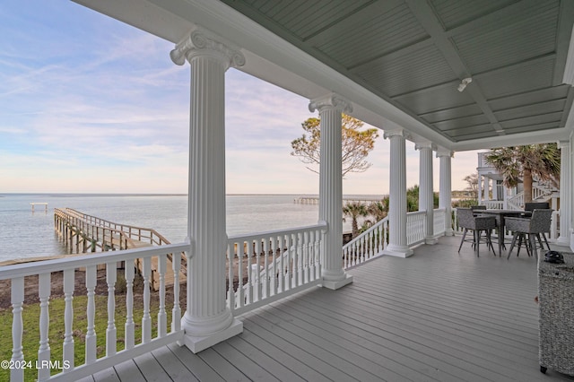 deck at dusk with a water view