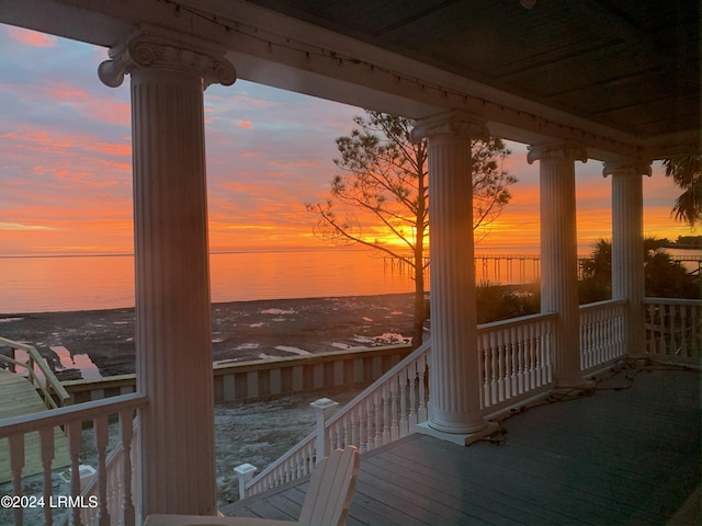 deck at dusk with a water view