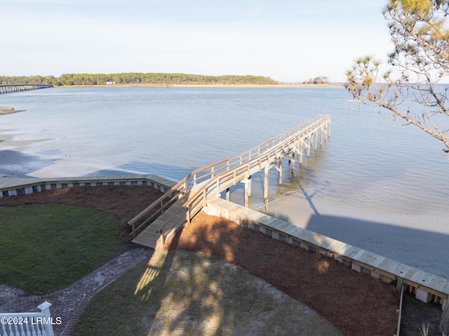 dock area with a water view