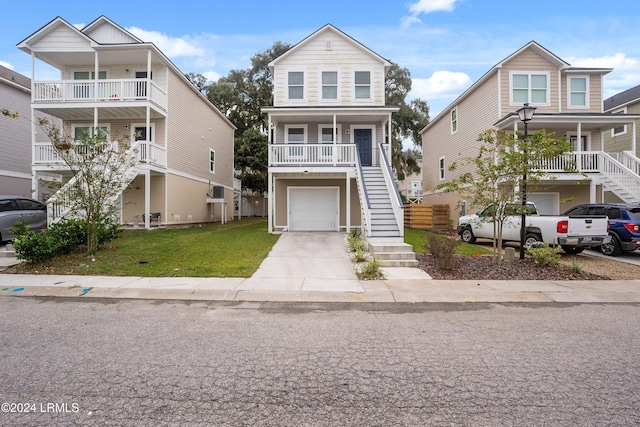 view of front facade featuring a garage and a front lawn