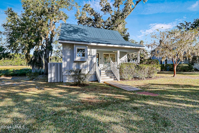 view of outbuilding with a porch