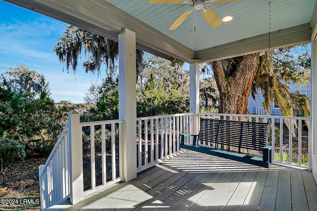 wooden terrace with ceiling fan