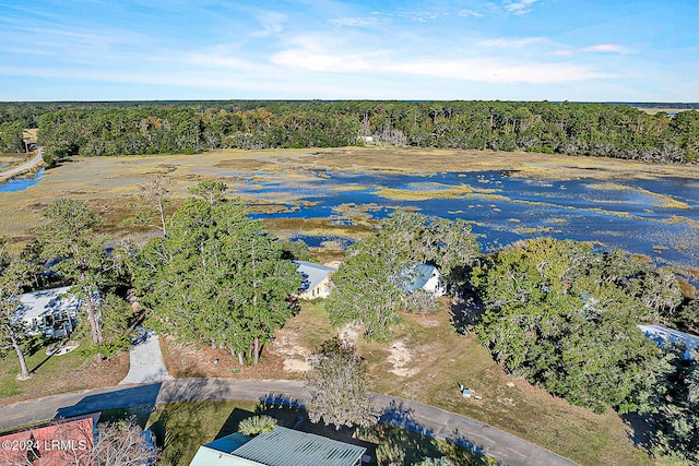 aerial view featuring a wooded view