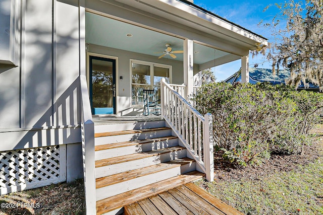 property entrance featuring ceiling fan and a porch