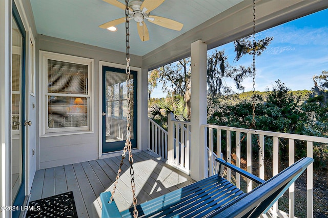 wooden deck with ceiling fan