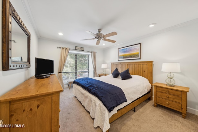 carpeted bedroom with ornamental molding and ceiling fan