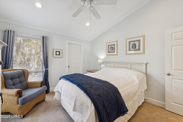 bedroom with vaulted ceiling, crown molding, light colored carpet, and ceiling fan