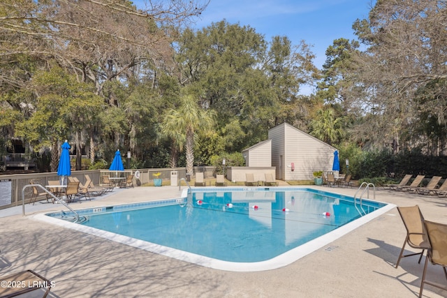 view of swimming pool featuring a patio