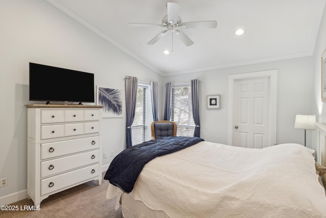 bedroom featuring vaulted ceiling, ornamental molding, ceiling fan, and carpet