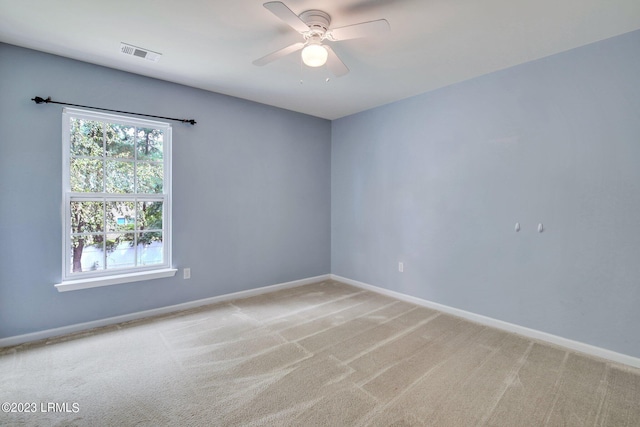7 Harbison Pl, Beaufort, SC 29906 - unfurnished room featuring light colored carpet and a ceiling fan