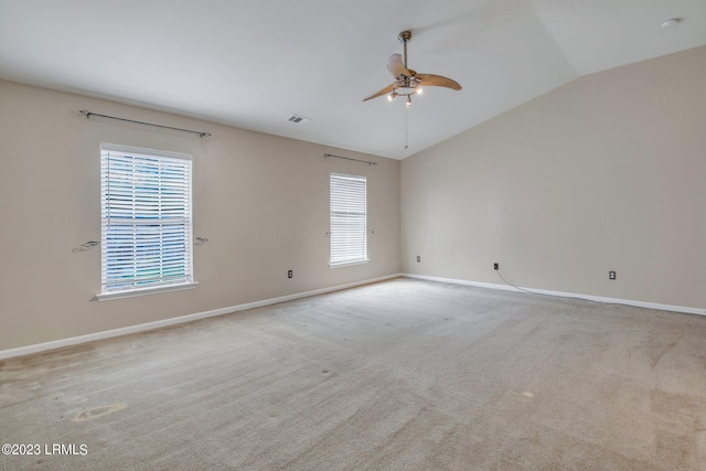 7 Harbison Pl, Beaufort, SC 29906 - unfurnished room featuring vaulted ceiling, a ceiling fan, and light colored carpet