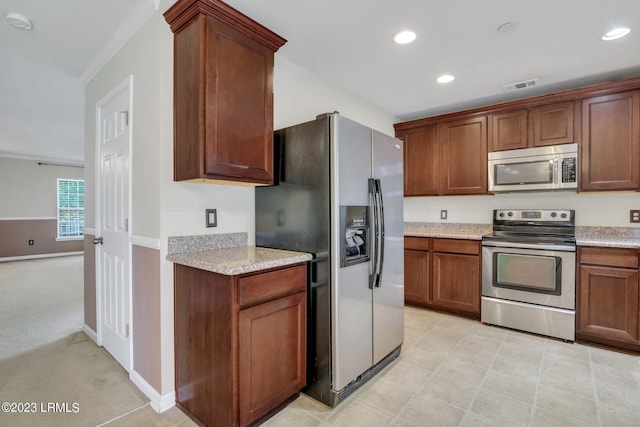 7 Harbison Pl, Beaufort, SC 29906 - kitchen featuring stainless steel appliances, recessed lighting, and ornamental molding