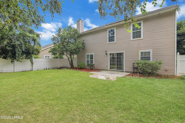 7 Harbison Pl, Beaufort, SC 29906 - rear view of house with a chimney and a patio