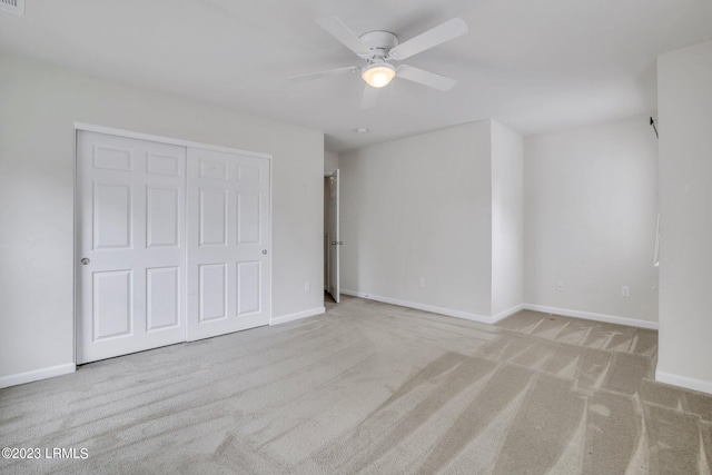 7 Harbison Pl, Beaufort, SC 29906 - unfurnished bedroom featuring carpet flooring, a closet, and a ceiling fan