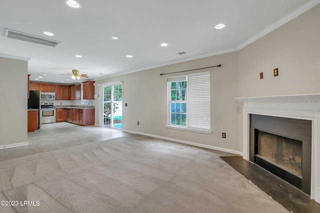 7 Harbison Pl, Beaufort, SC 29906 - unfurnished living room featuring ornamental molding, recessed lighting, a fireplace, a ceiling fan, and light colored carpet