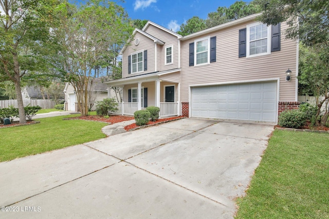 7 Harbison Pl, Beaufort, SC 29906 - traditional-style home featuring a porch, brick siding, an attached garage, and concrete driveway