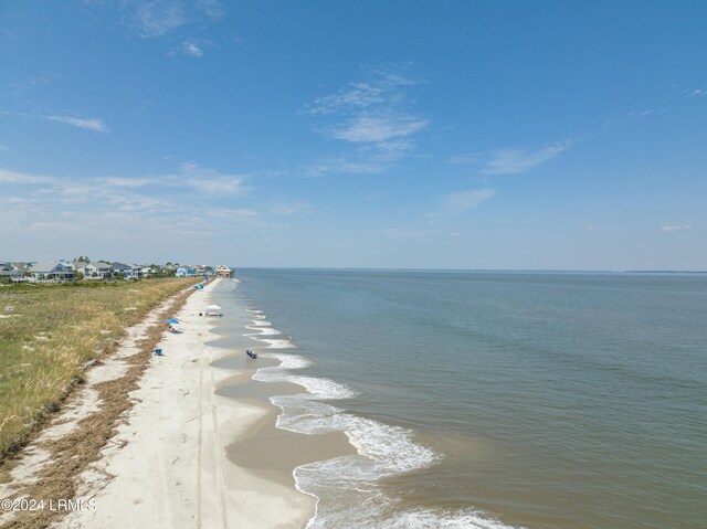 view of water feature with a beach view