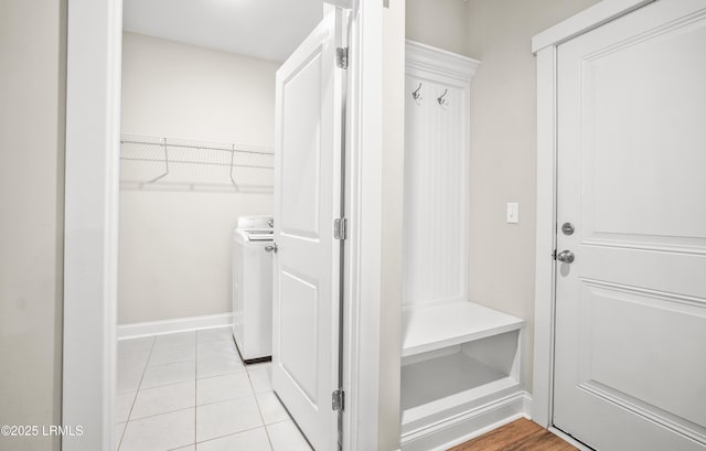 28 Laughing Gull Dr, Beaufort, SC 29907 - mudroom featuring washer / dryer, light tile patterned flooring, and baseboards