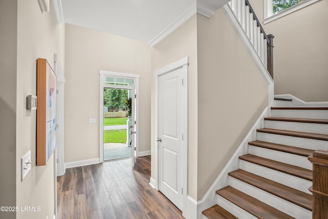 28 Laughing Gull Dr, Beaufort, SC 29907 - foyer featuring stairway, wood finished floors, ornamental molding, and baseboards