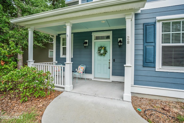 28 Laughing Gull Dr, Beaufort, SC 29907 - property entrance with a porch