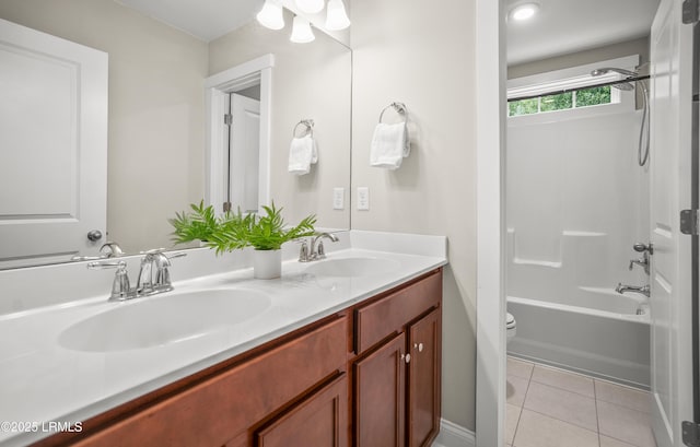 28 Laughing Gull Dr, Beaufort, SC 29907 - bathroom with toilet, double vanity, tile patterned flooring, and shower / bath combination