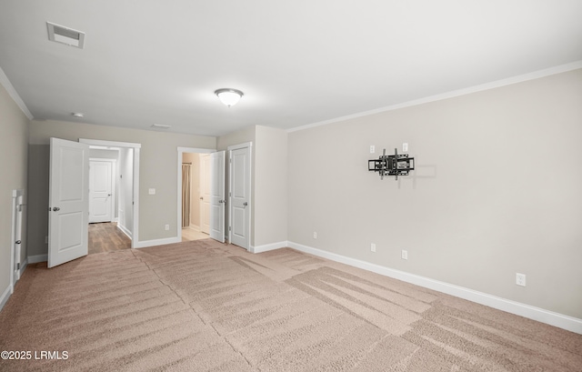 28 Laughing Gull Dr, Beaufort, SC 29907 - unfurnished bedroom featuring baseboards, crown molding, and carpet