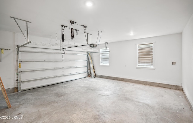 28 Laughing Gull Dr, Beaufort, SC 29907 - garage with a garage door opener and baseboards