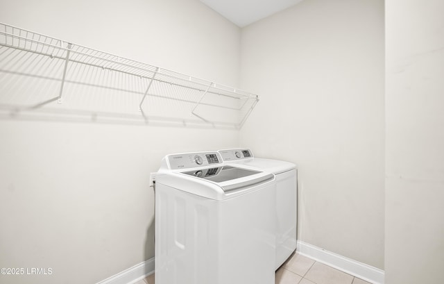 28 Laughing Gull Dr, Beaufort, SC 29907 - washroom with washing machine and dryer, baseboards, and light tile patterned floors