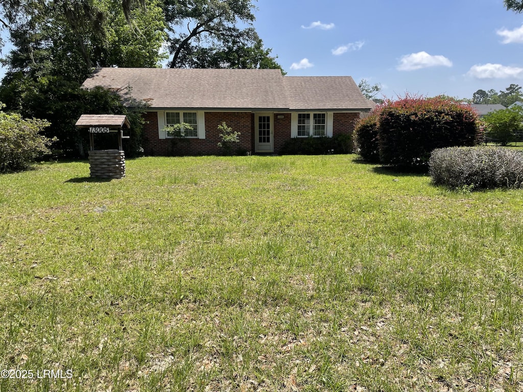 13005 Gail St, Beaufort, SC 29906 - view of front of property featuring a front lawn and brick siding