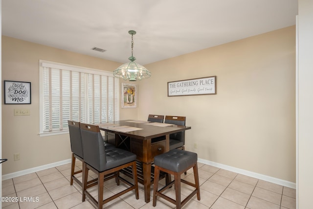 6 River Marsh Ln, Okatie, SC 29909 - dining space with a chandelier, light tile patterned floors, and baseboards