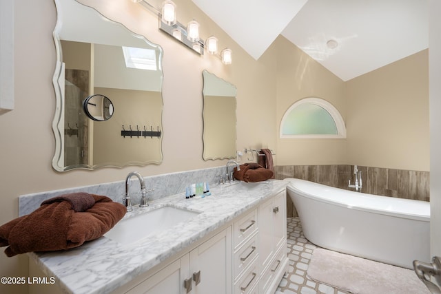 6 River Marsh Ln, Okatie, SC 29909 - bathroom featuring double vanity, a soaking tub, and wainscoting