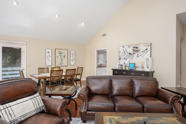6 River Marsh Ln, Okatie, SC 29909 - living area with wood finished floors, high vaulted ceiling, recessed lighting, and baseboards
