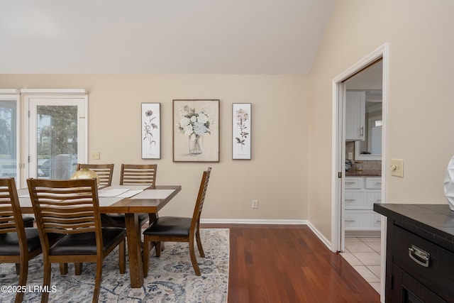 6 River Marsh Ln, Okatie, SC 29909 - dining space featuring wood finished floors, baseboards, and lofted ceiling