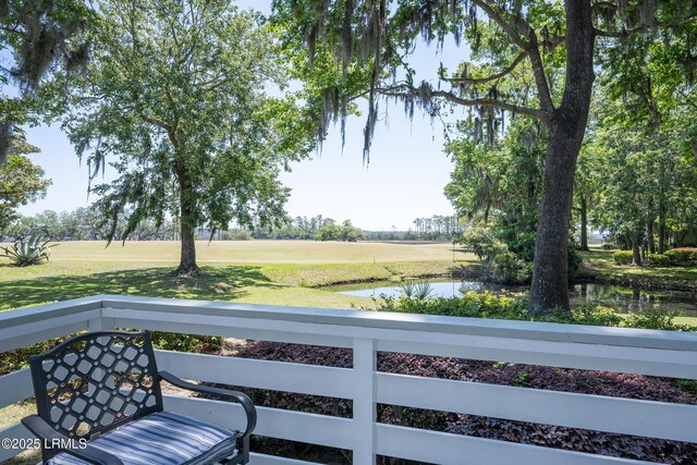 6 River Marsh Ln, Okatie, SC 29909 - wooden deck with a water view