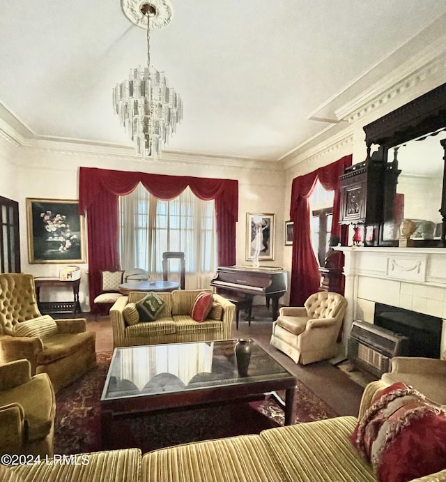 901 7th St W, Fairfax, SC 29827 - carpeted living room with a notable chandelier, a fireplace, and ornamental molding
