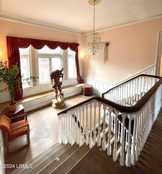 901 7th St W, Fairfax, SC 29827 - stairs with hardwood / wood-style flooring, crown molding, and a notable chandelier