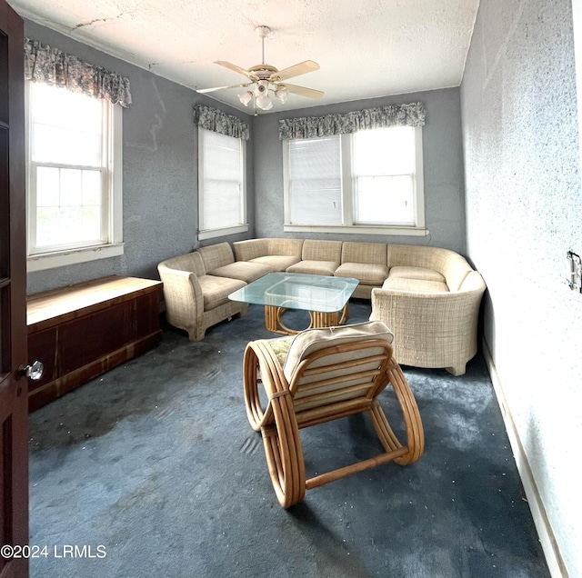 901 7th St W, Fairfax, SC 29827 - sitting room with a wealth of natural light, a textured ceiling, and dark colored carpet