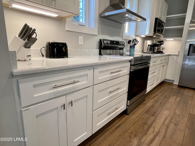 kitchen with extractor fan, white cabinets, appliances with stainless steel finishes, open shelves, and dark wood finished floors