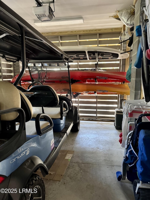 garage featuring a garage door opener